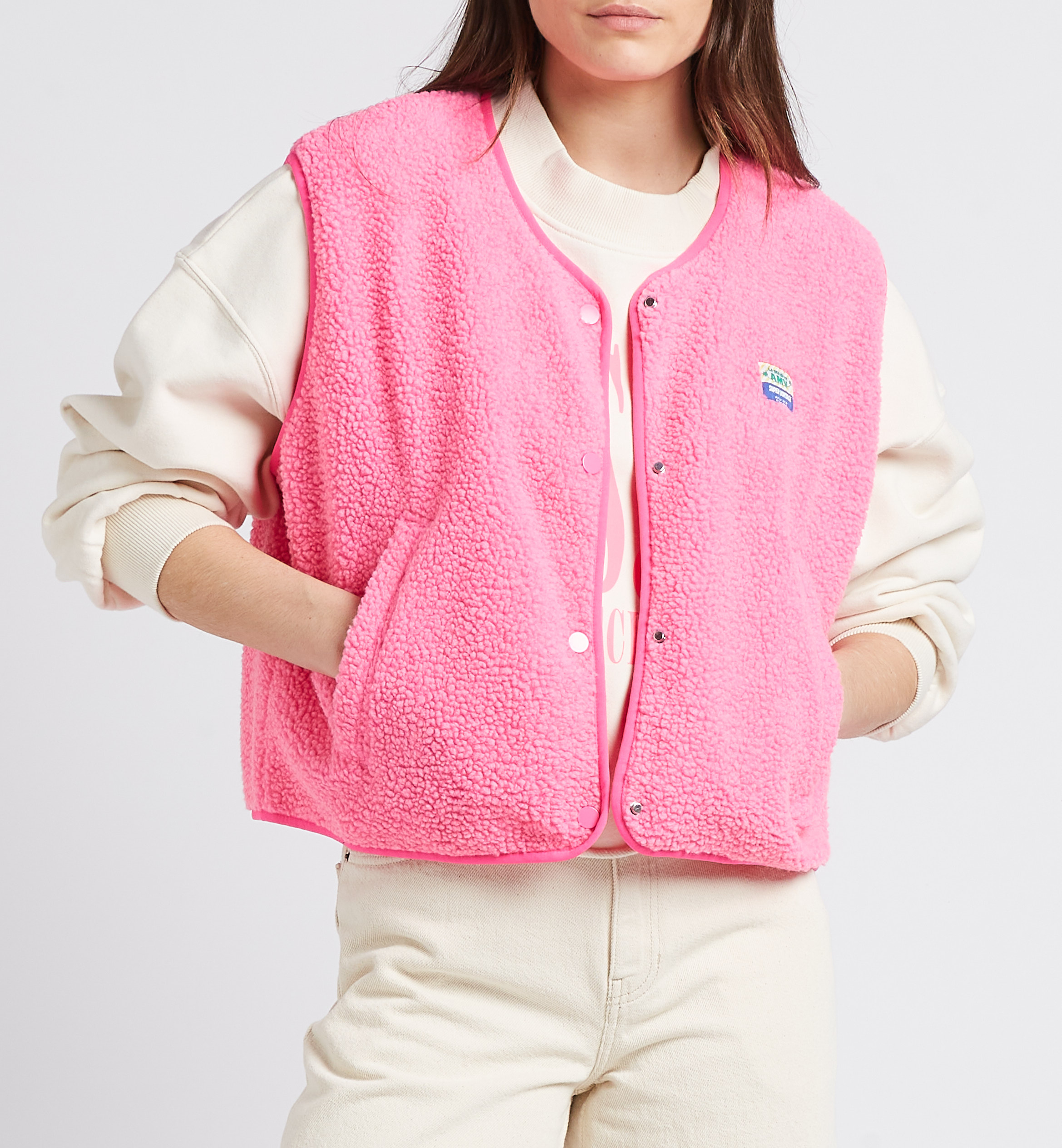Gilet col rond molletonné sans manches hoktown  Pink acid chine