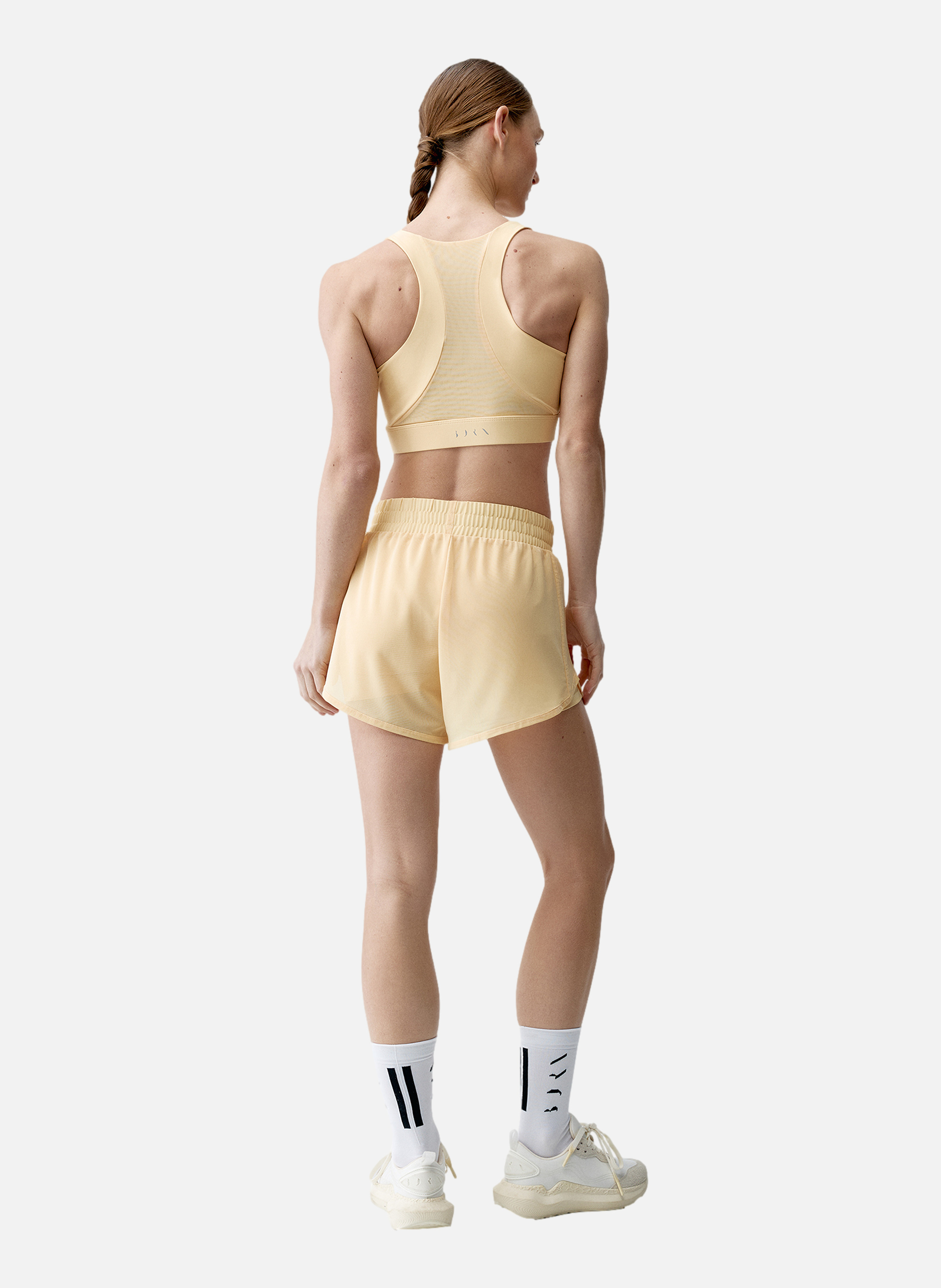 Short sport perfomance running padma 2.0 BORN LIVING YOGA Jaune