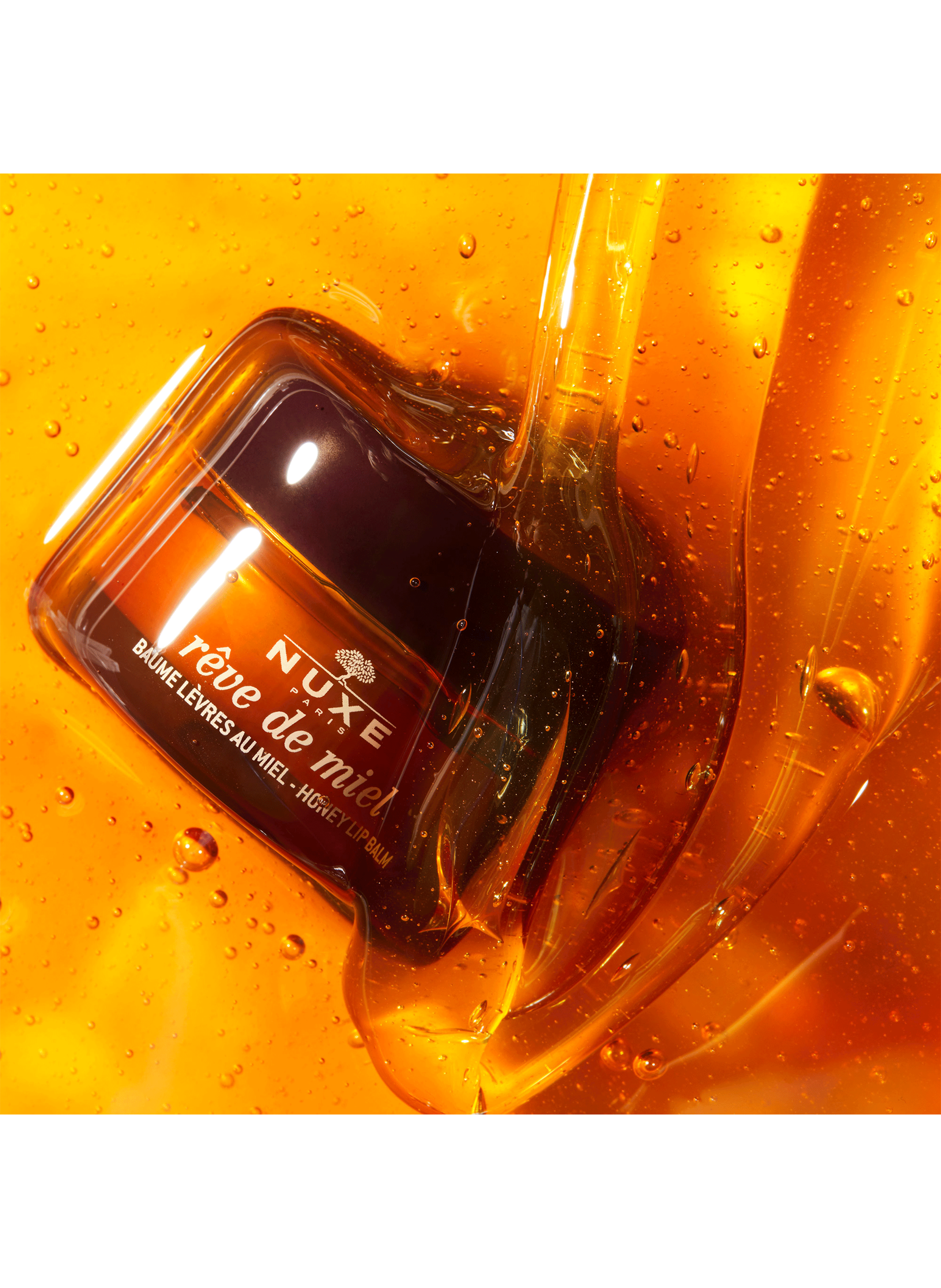 Baume à Lèvres nourrissant et réparateur Rêve de Miel® NUXE No color