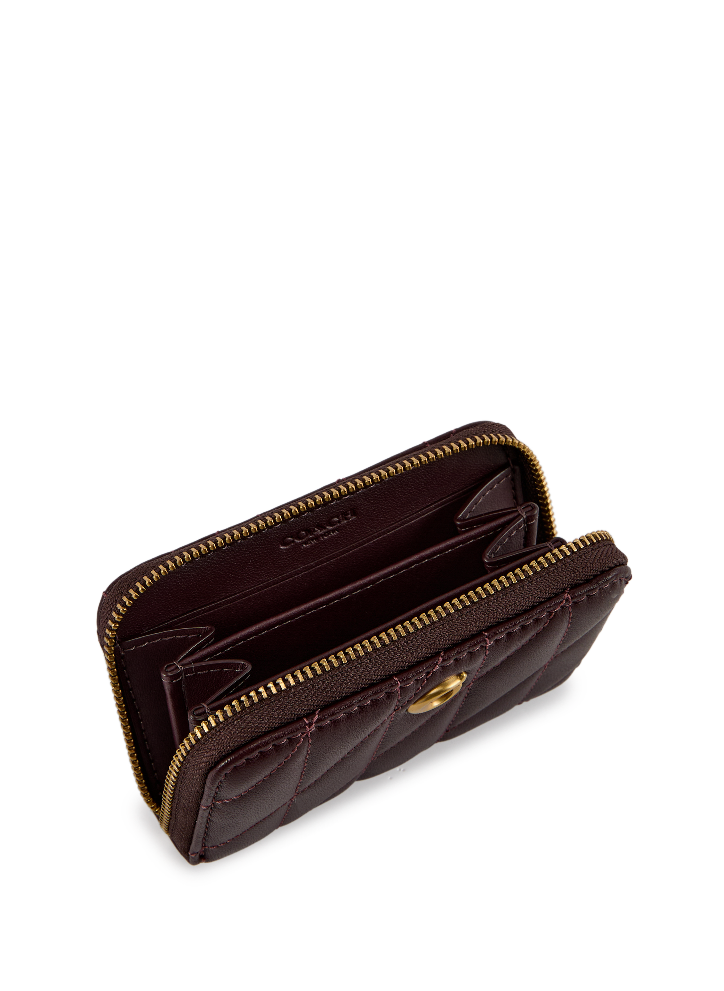 Porte-monnaie zippé matelassé en cuir COACH Violet