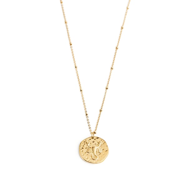 Collier avec pendentif signe astrologique