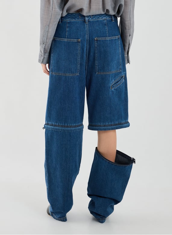 Jeans sous genou amovible en coton | Bleu by TIBI Jeans sous genou amovible en coton Bleu