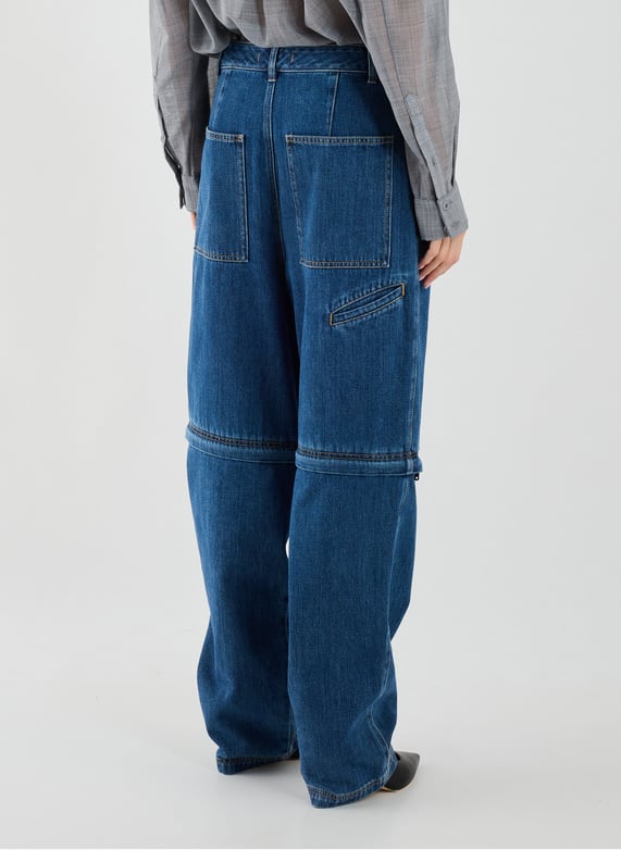 Jeans sous genou amovible en coton | Bleu by TIBI Jeans sous genou amovible en coton Bleu