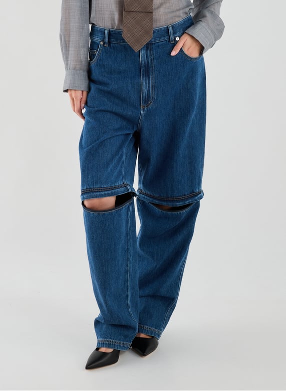 Jeans sous genou amovible en coton | Bleu by TIBI Jeans sous genou amovible en coton Bleu