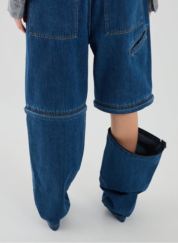 Jeans sous genou amovible en coton | Bleu by TIBI Jeans sous genou amovible en coton Bleu