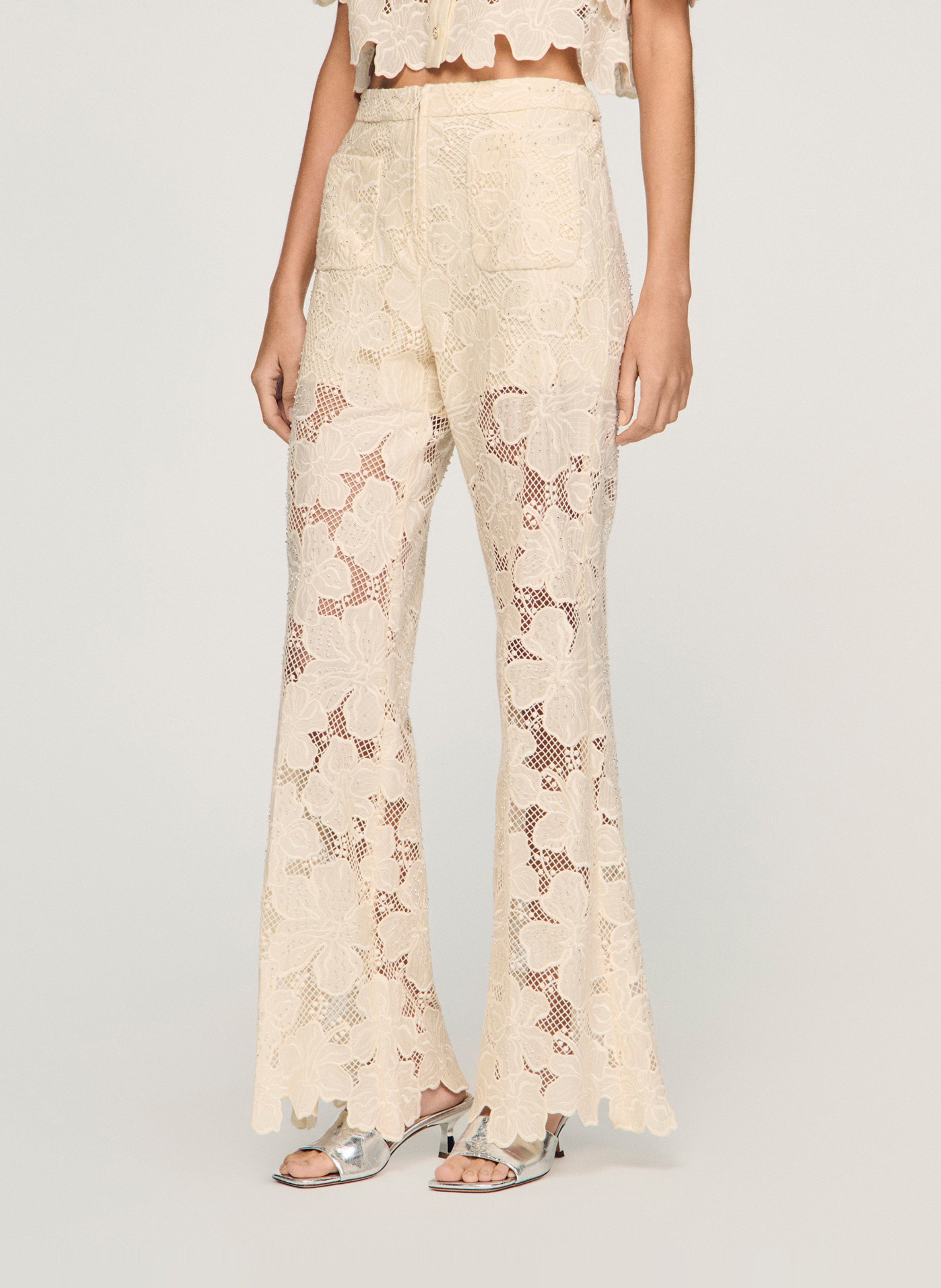 Pantalon évasé en guipure SANDRO Beige