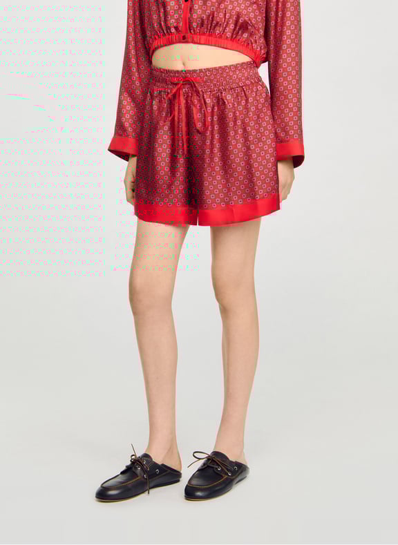 Short large décontracté à motifs Rouge by SANDRO SANDRO Short large décontracté à motifs Rouge