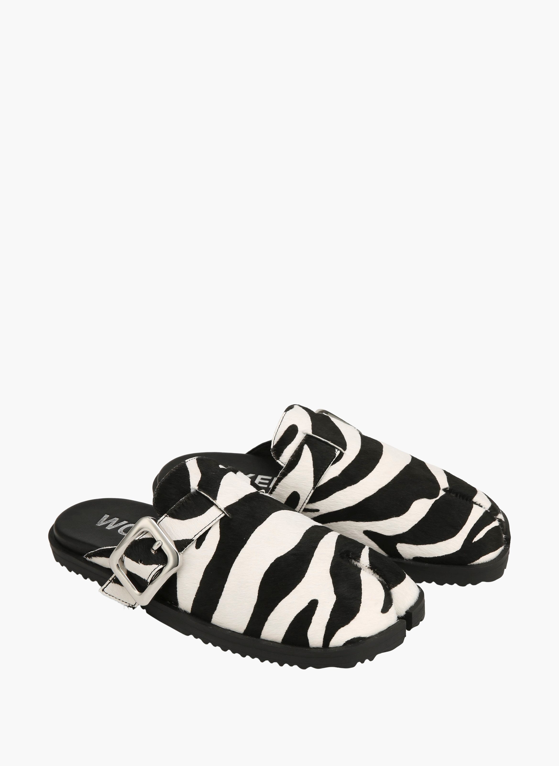 Mules lola en cuir poulain NAKED WOLFE Rayé