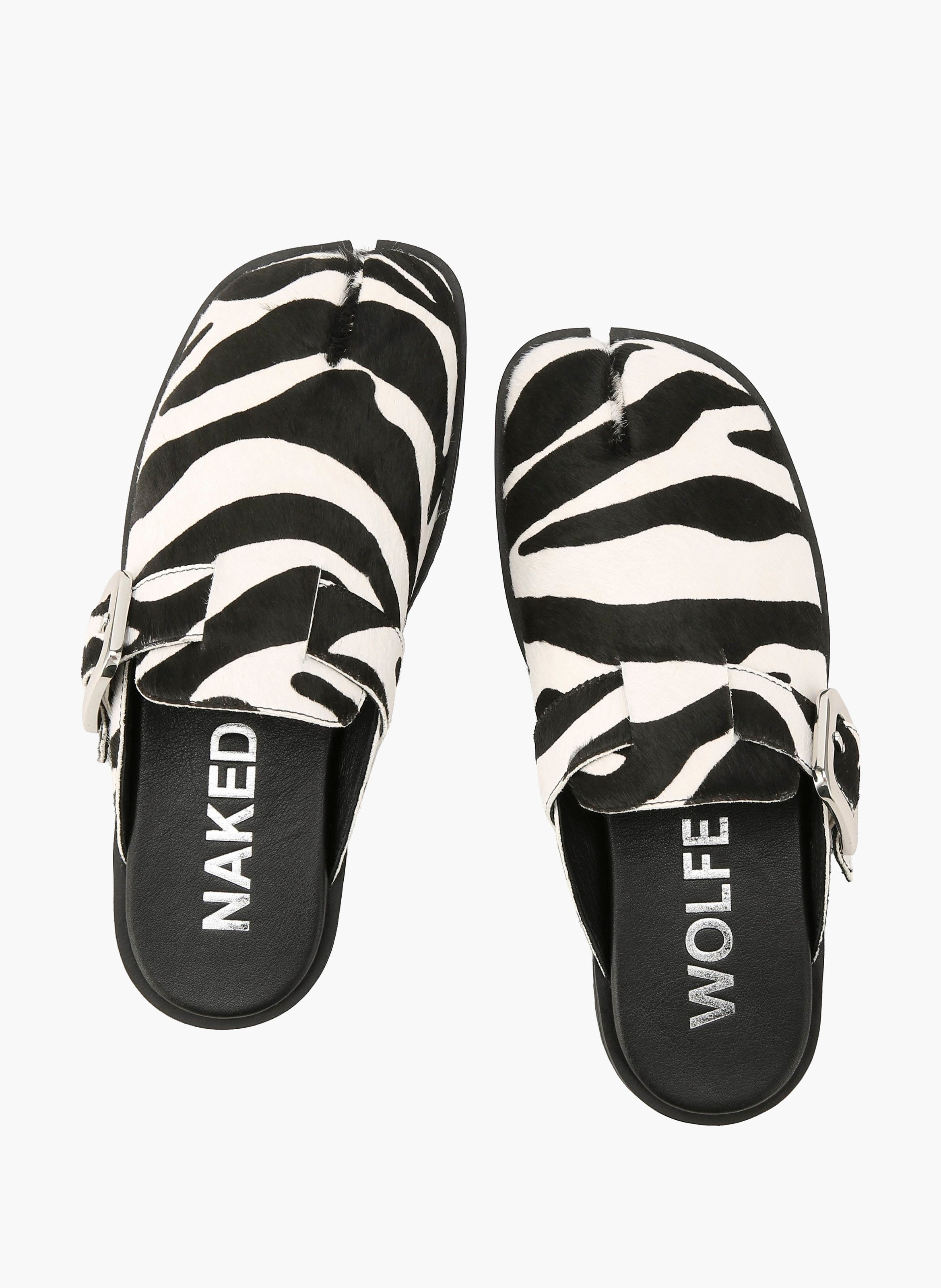 Mules lola en cuir poulain NAKED WOLFE Rayé
