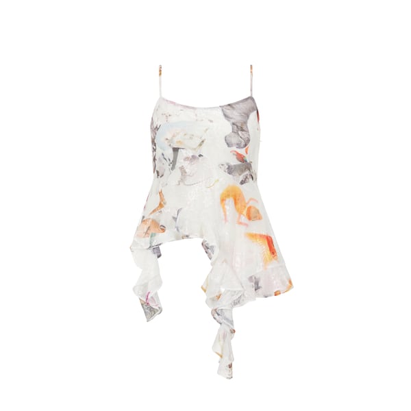 Top asymétrique à volant