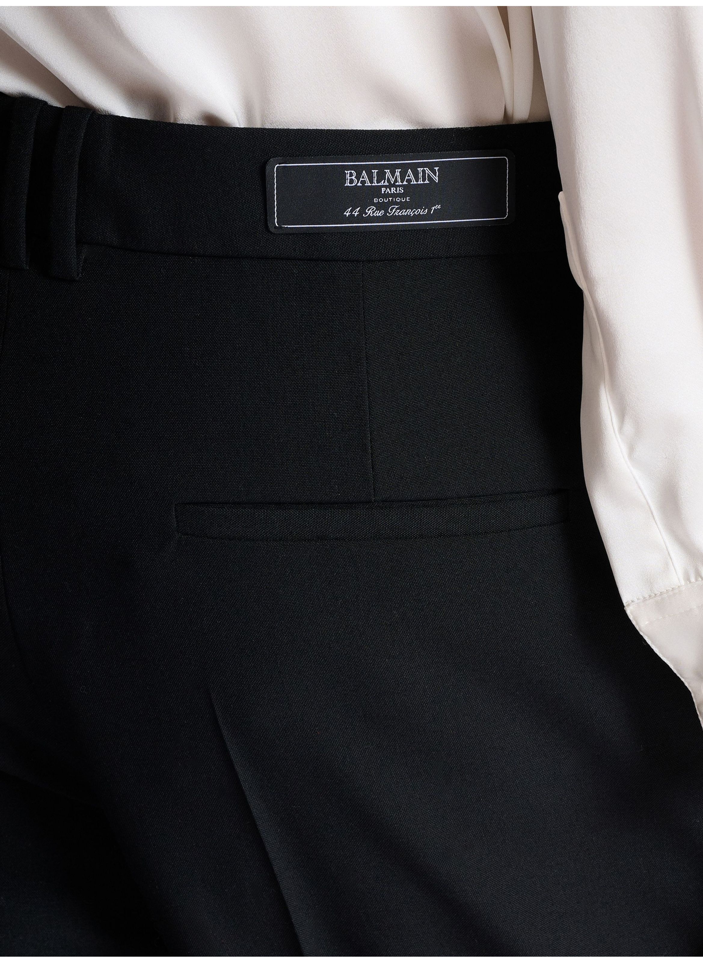 Pantalon à plis en laine brodée « sand effect » BALMAIN Noir