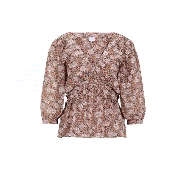 Chemise à fleurs et volants