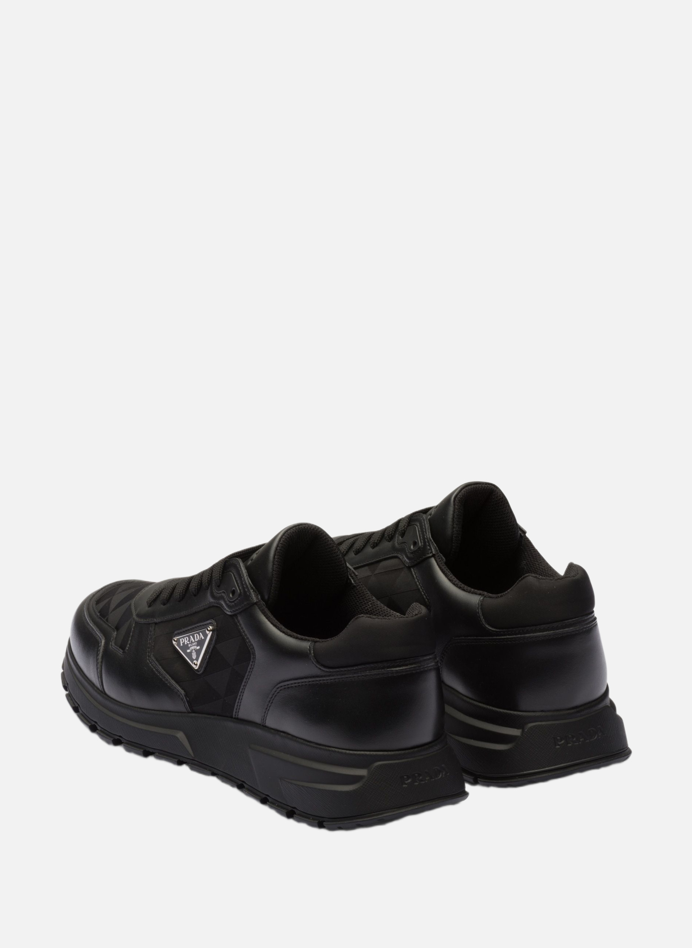 Baskets montantes en cuir et re-nylon PRADA Noir