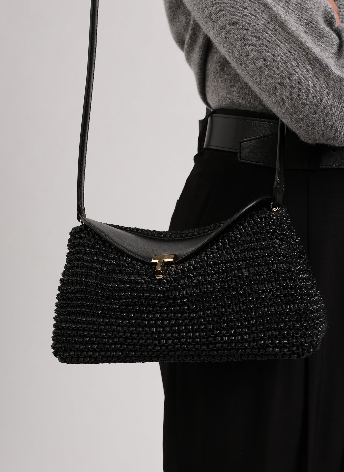 Braided leather T-lock handbag TOTEME Black