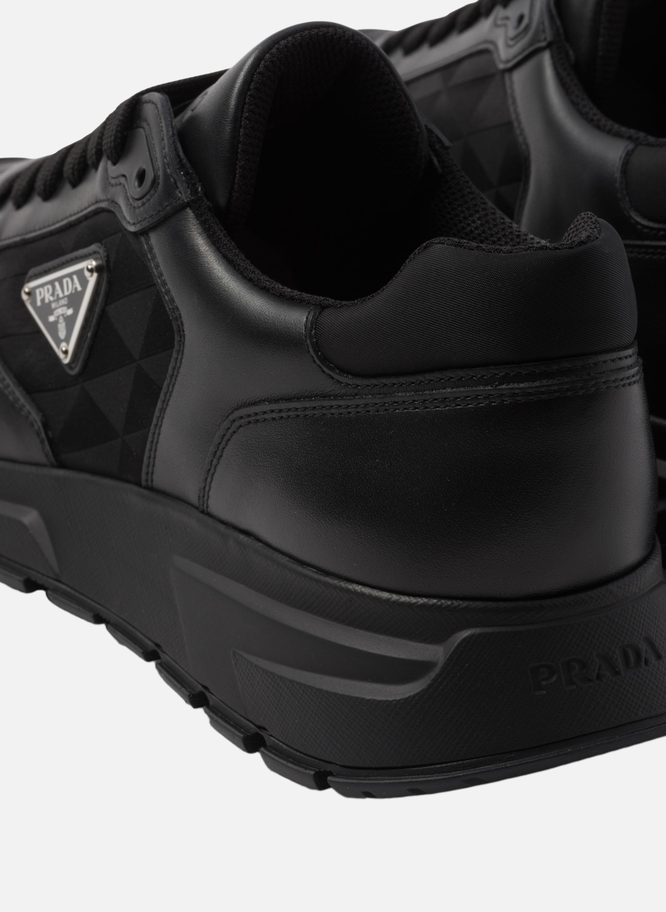 Baskets montantes en cuir et re-nylon PRADA Noir