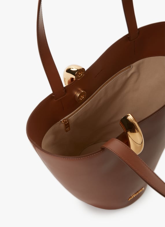 The average Bambola | Brown by JACQUEMUS The average Bambola Brown