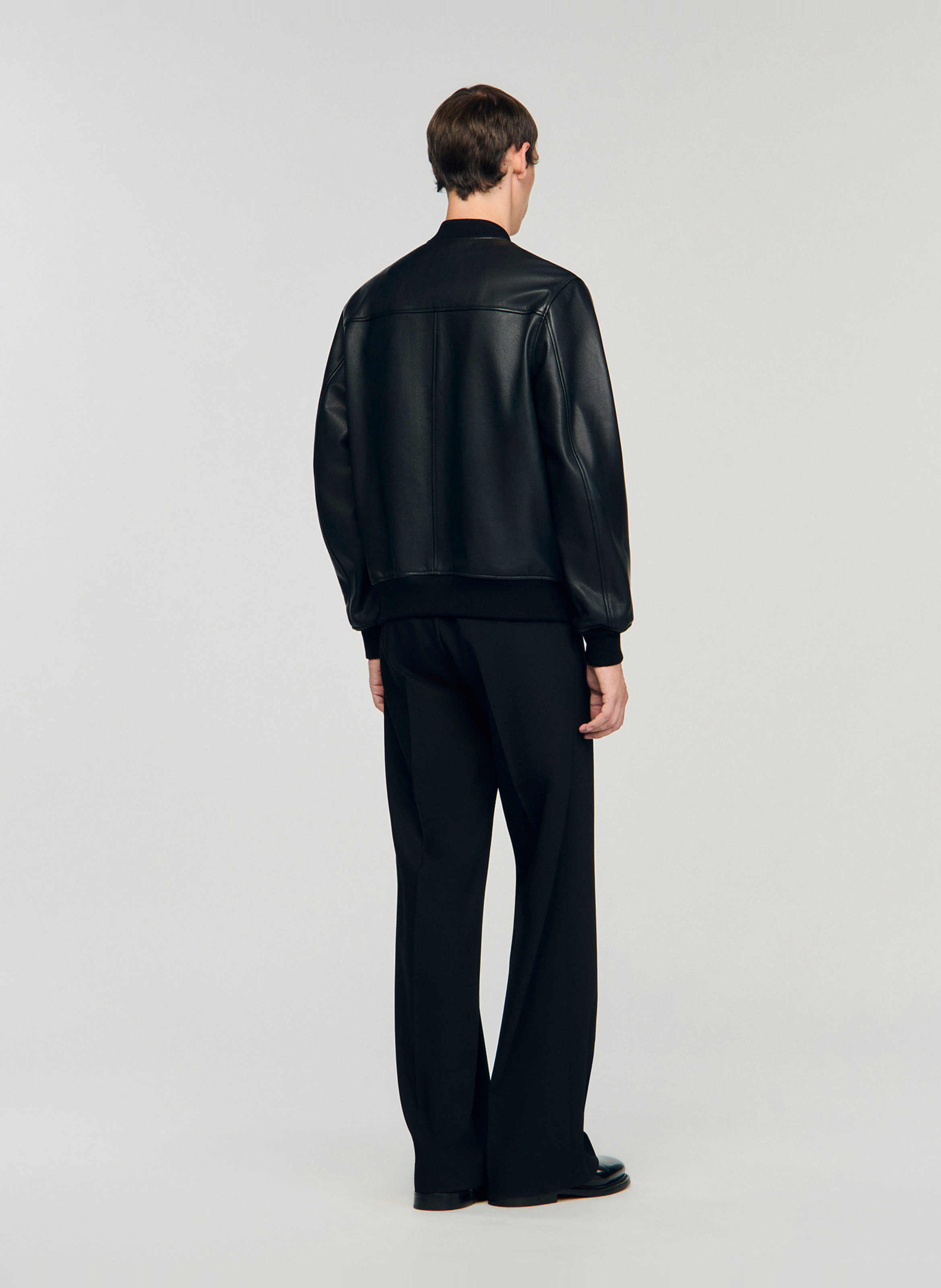Blouson droit zippé en cuir SANDRO Noir