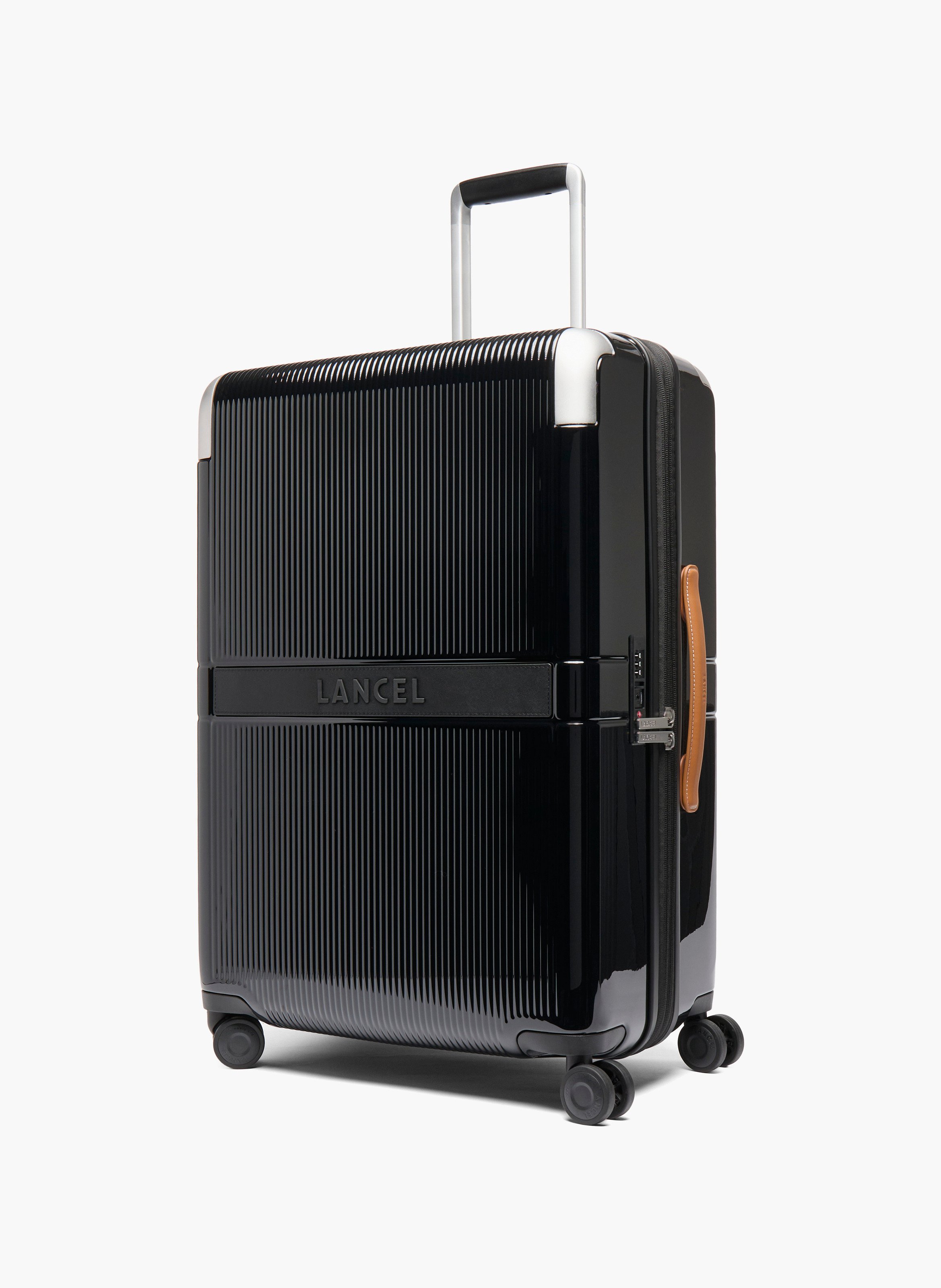 Harde middelgrote trolley met 4 wielen, van gerecycled polycarbonaat, met leren details. LANCEL Zwart