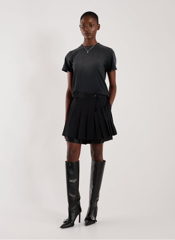 Jupe-short plissé en laine | Noir by HELMUT LANG Jupe-short plissé en laine Noir