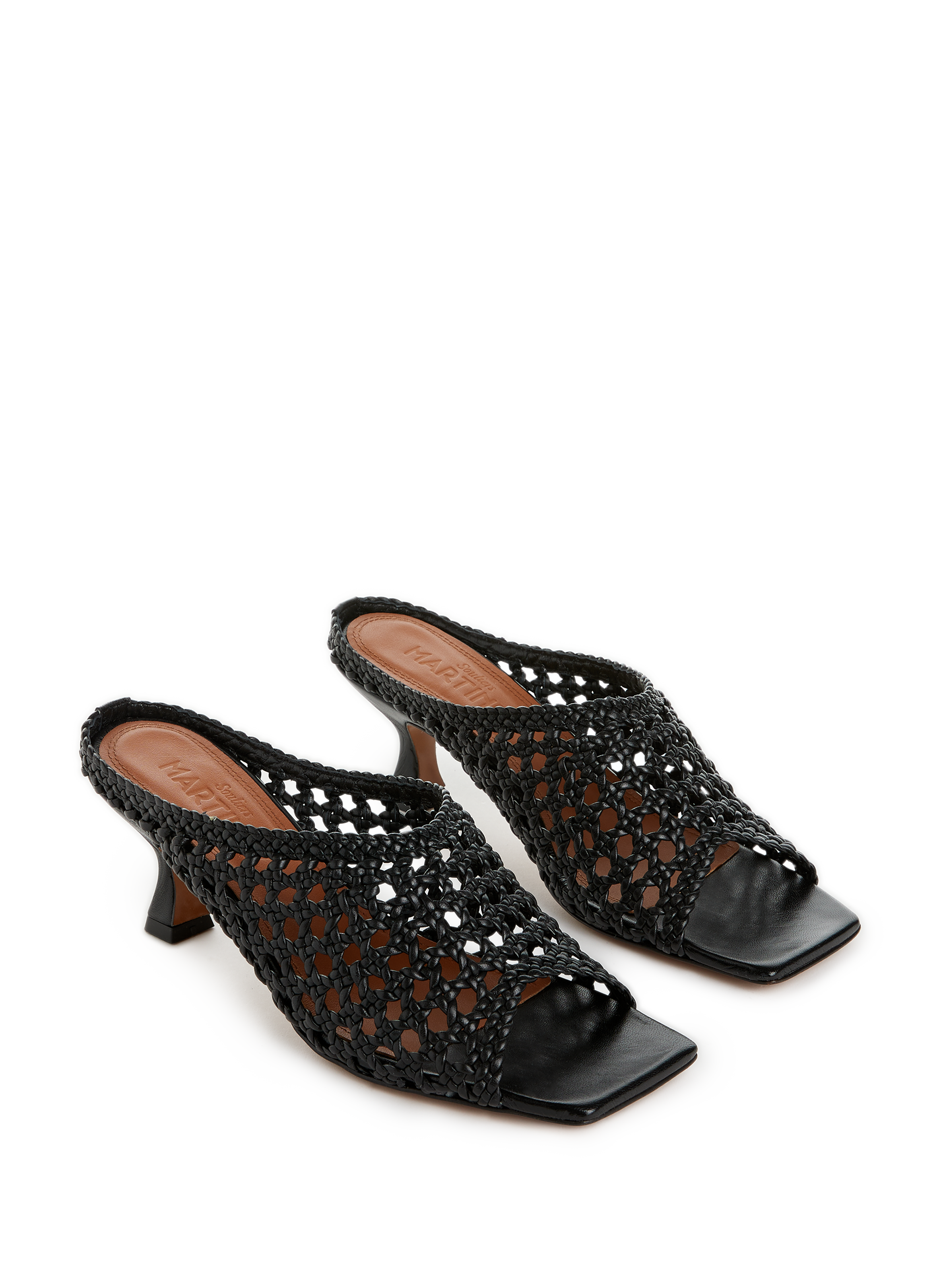Mules en cuir tressées