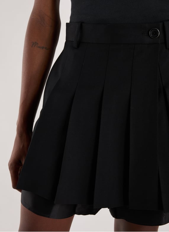 Jupe-short plissé en laine | Noir by HELMUT LANG Jupe-short plissé en laine Noir