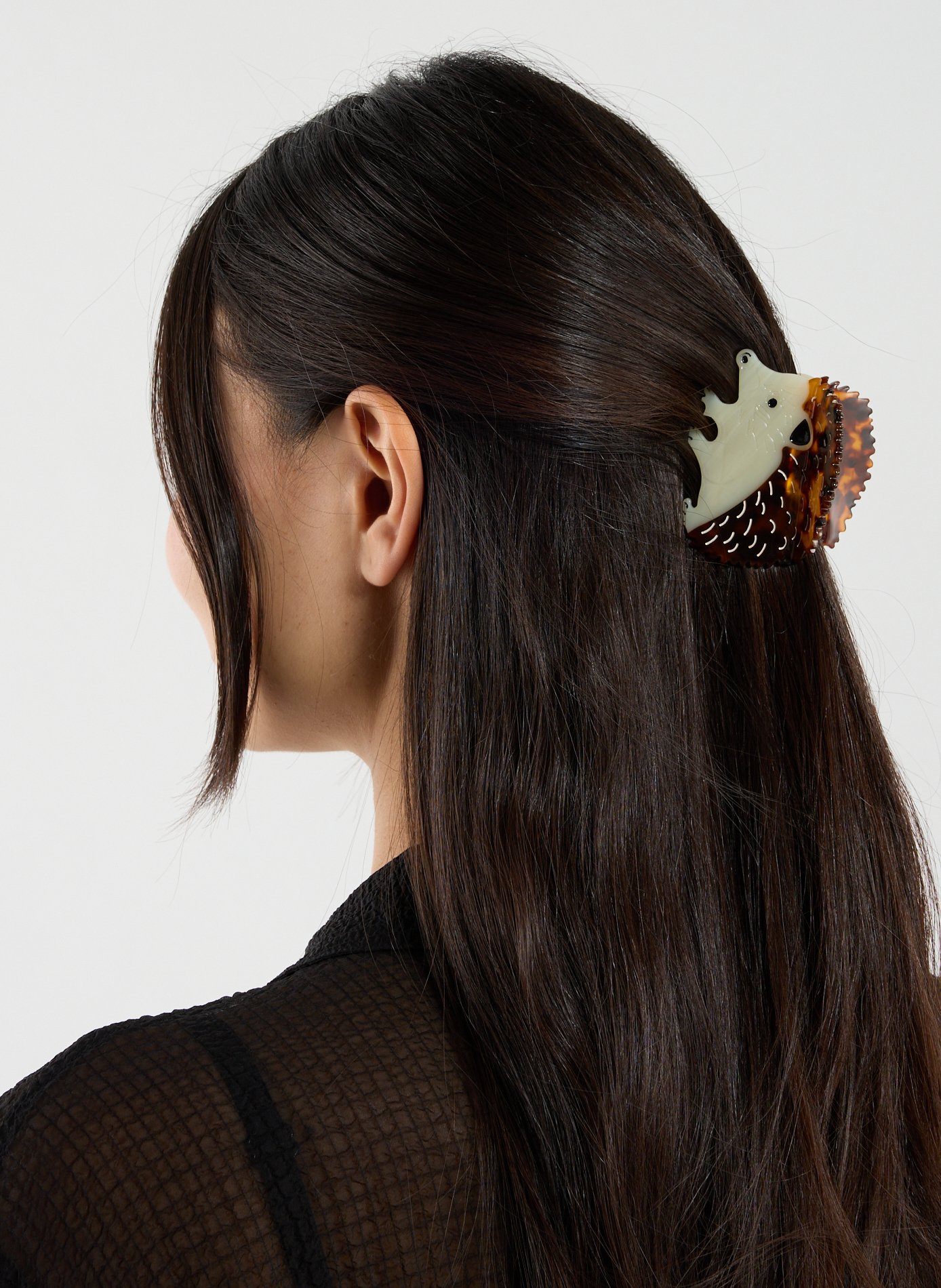 AU PRINTEMPS PARIS Pince à cheveux forme hérisson Marron