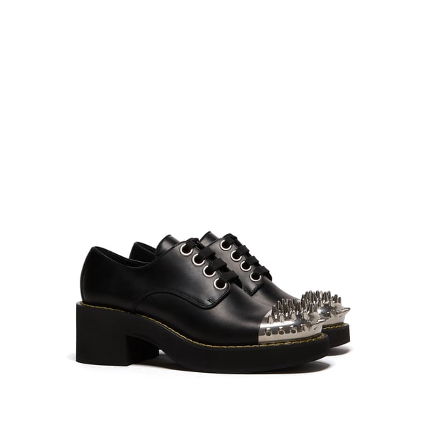 Derbies cloutées en cuir