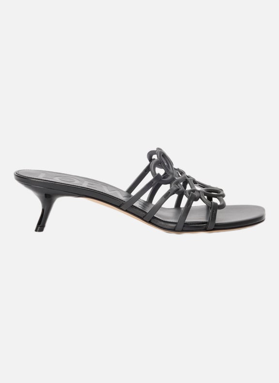 Mules à talons Petal Anagram en cuir de veai Noir by LOEWE LOEWE Mules à talons Petal Anagram en cuir de veai Noir