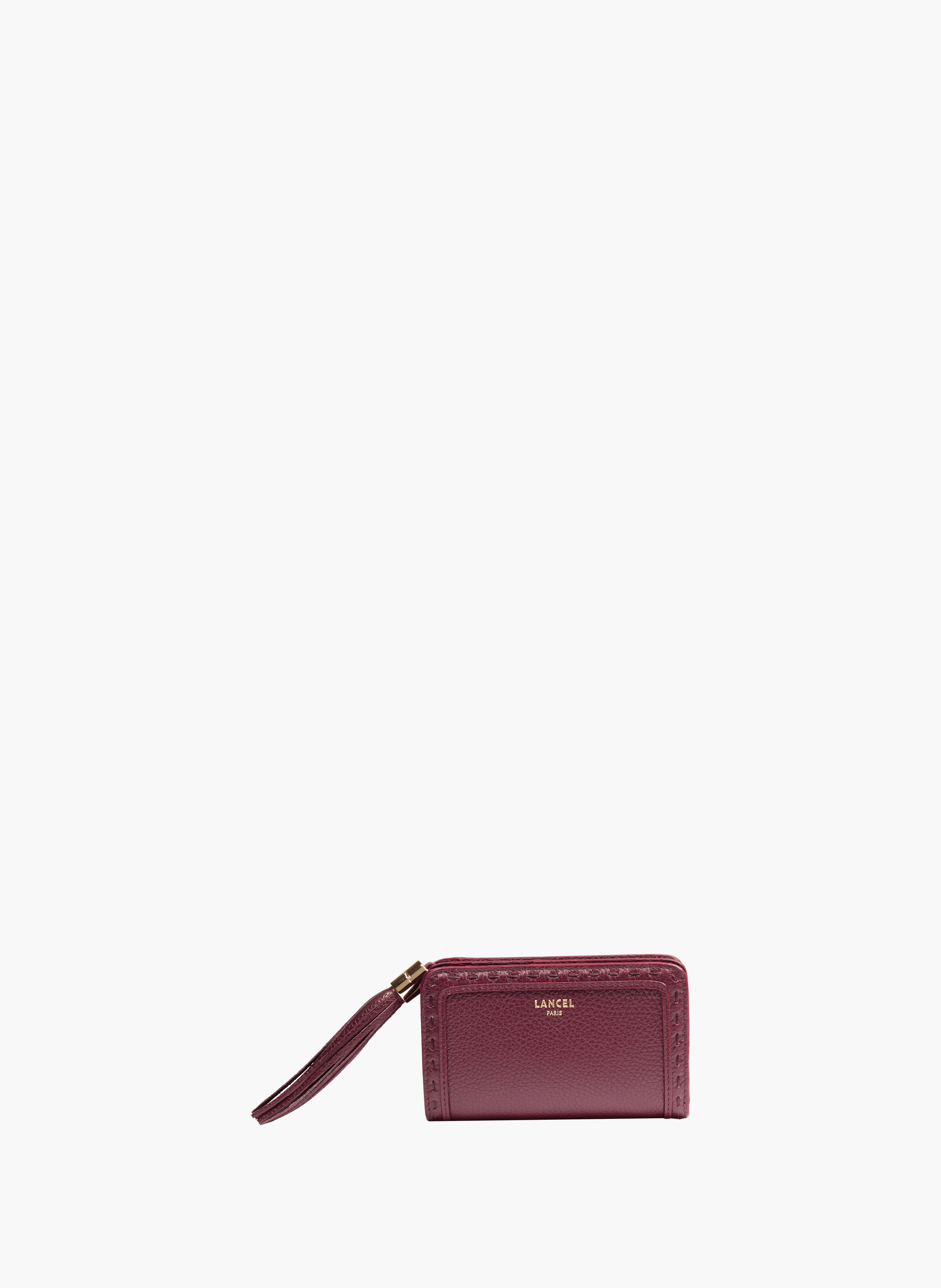 Compacte rechthoekige portefeuille van Lancel's Premier Flirt in leer.  Cassis