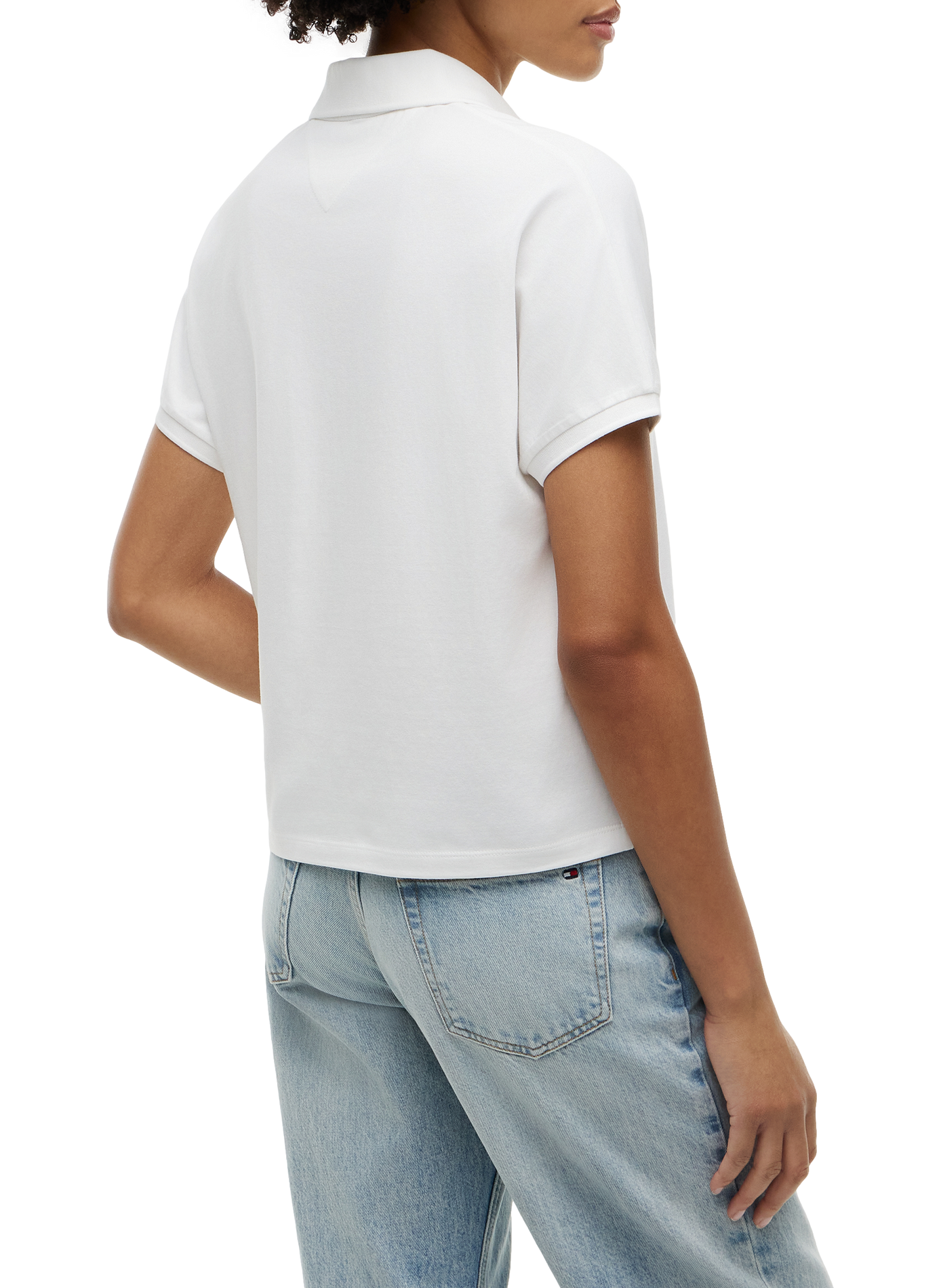 Plain polo shirt with embroidered logo in blended cotton. TOMMY HILFIGER White