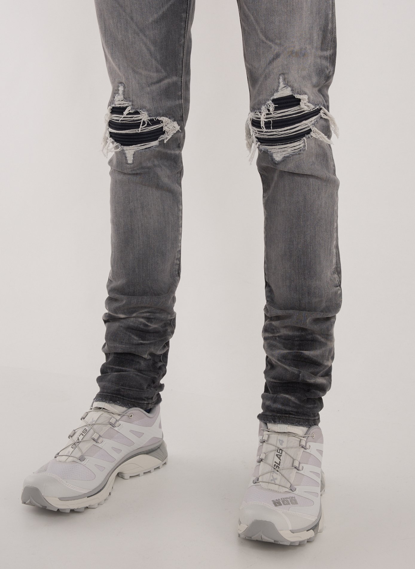 Jeans délavé et déchiré en coton mélangé AMIRI Gris