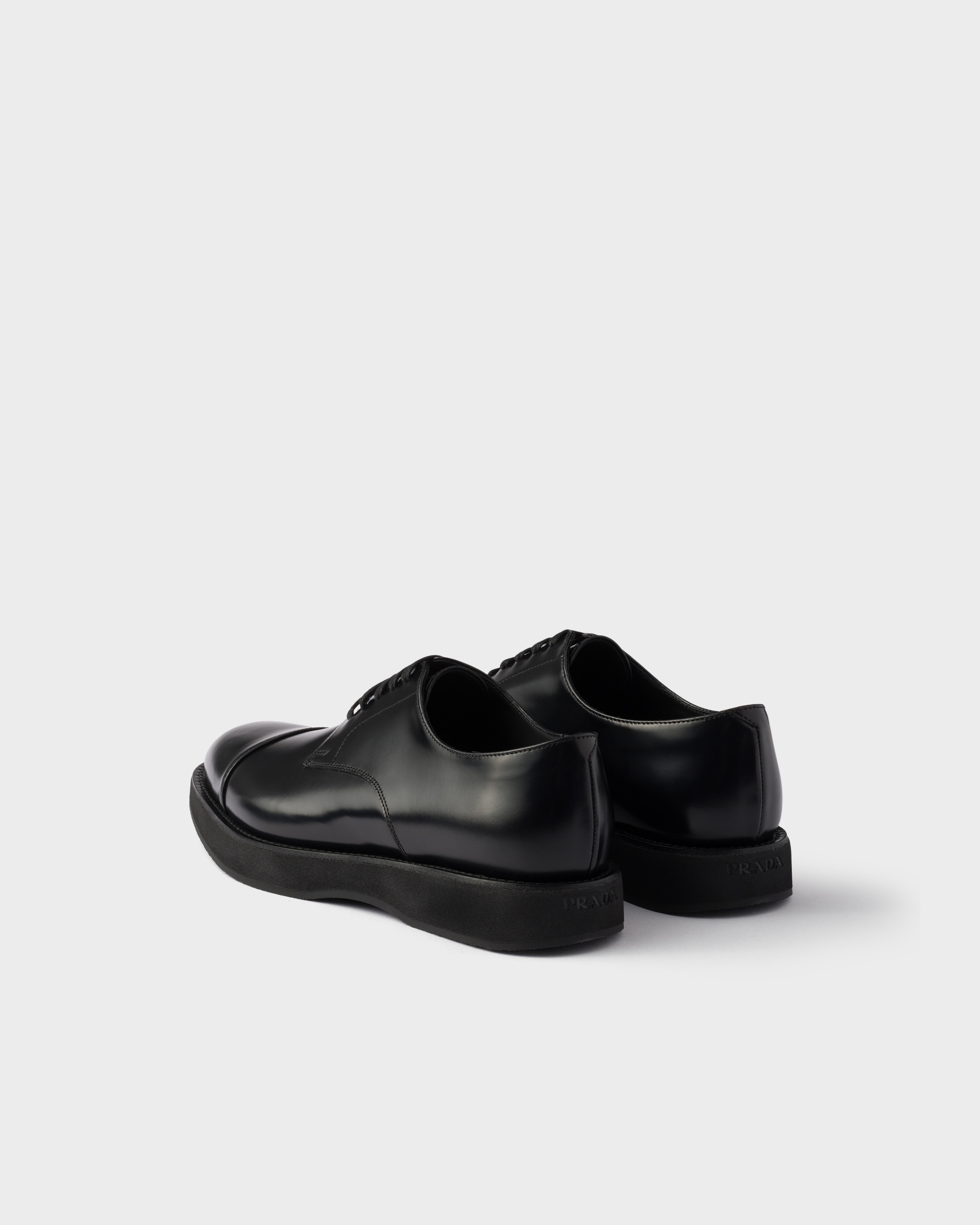 Chaussures à lacets en cuir brossé PRADA Noir