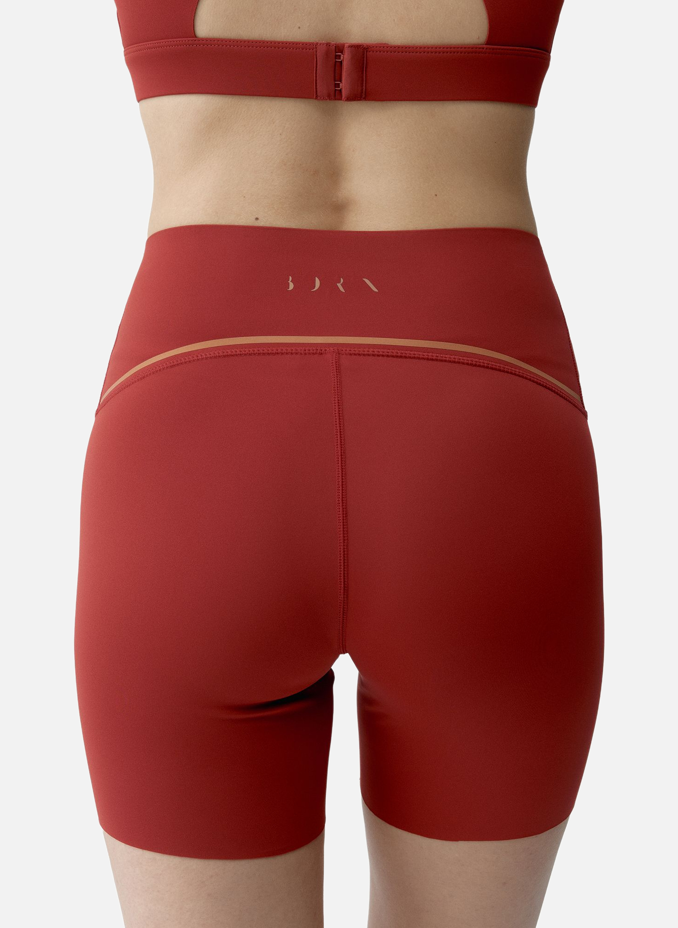 Short moulant de sport performance brone BORN LIVING YOGA Orange