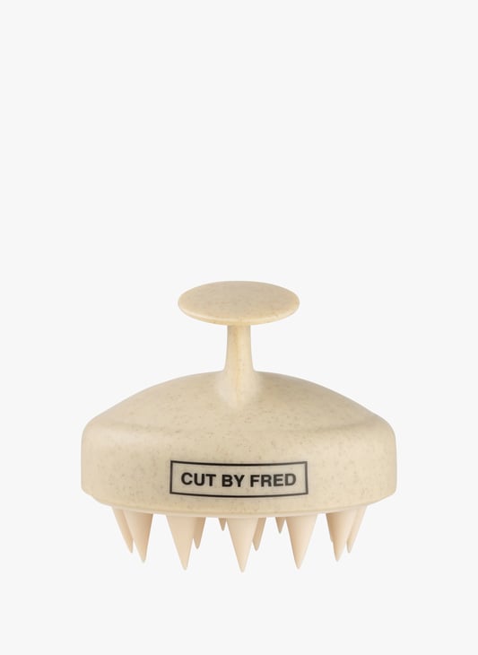 Brosse stimulante cuir chevelu