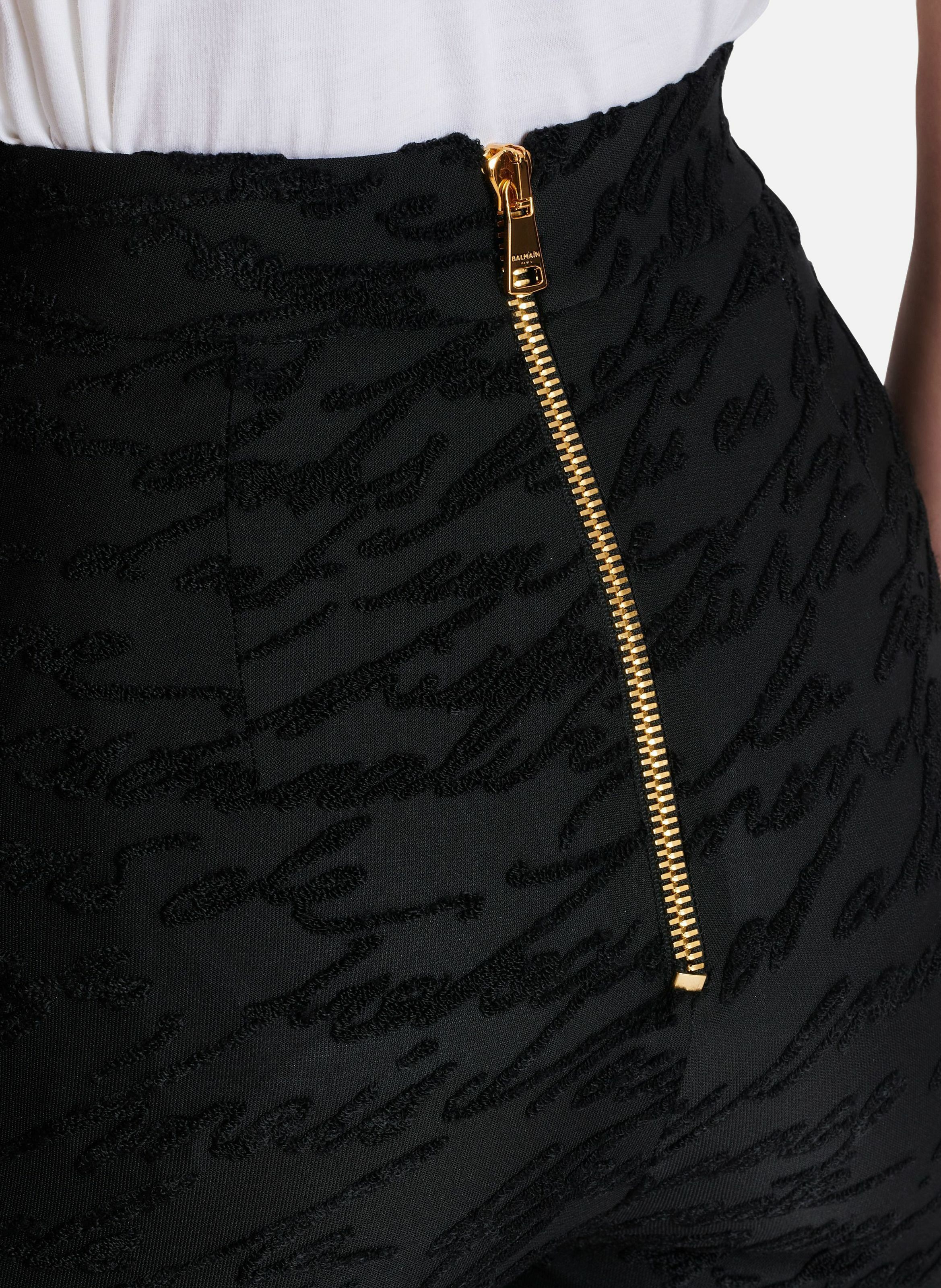 Legging en maille jacquard à motif « lettre d'amour » BALMAIN Noir