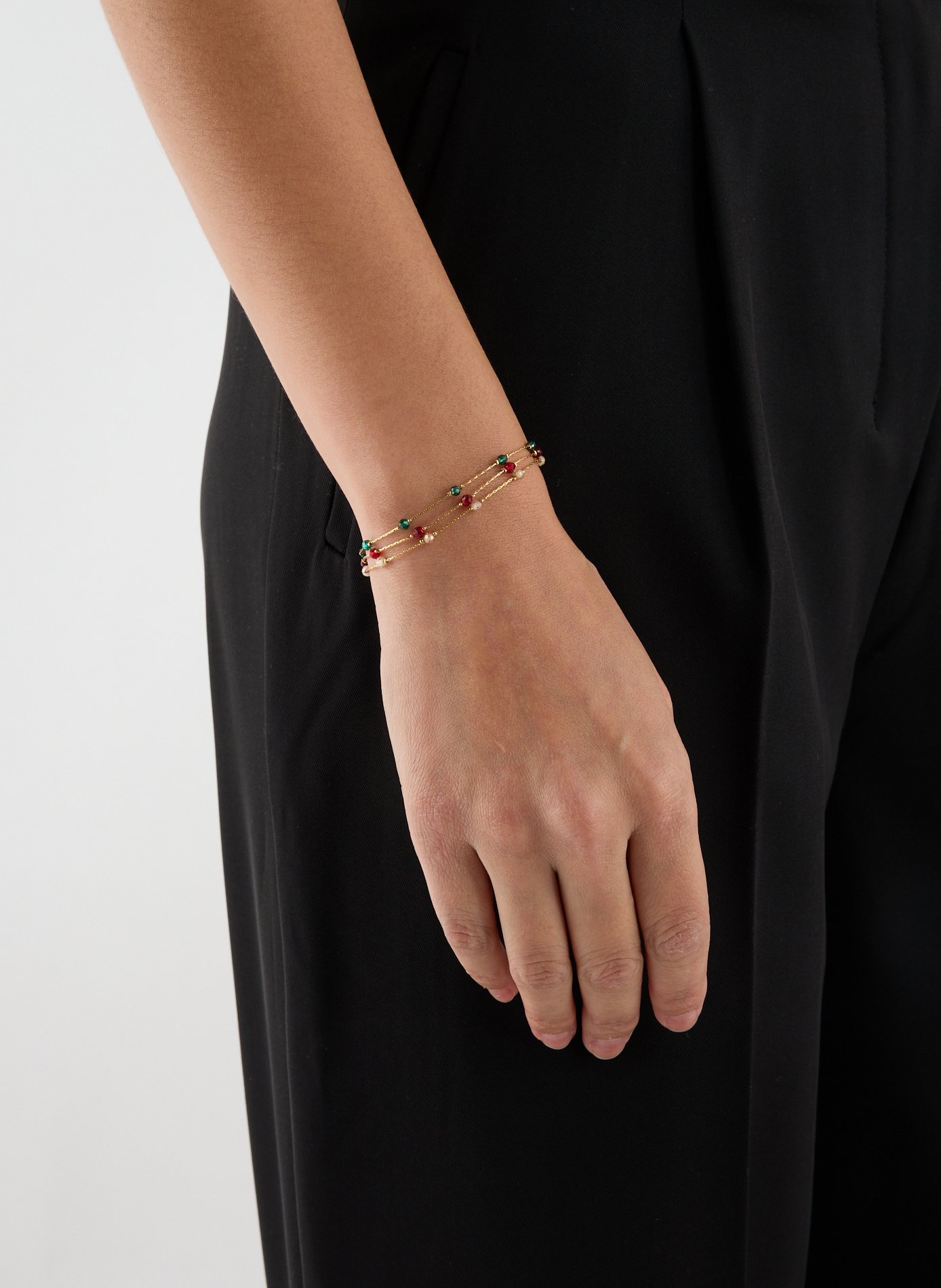 AU PRINTEMPS PARIS Bracelet avec perles en verre Beige