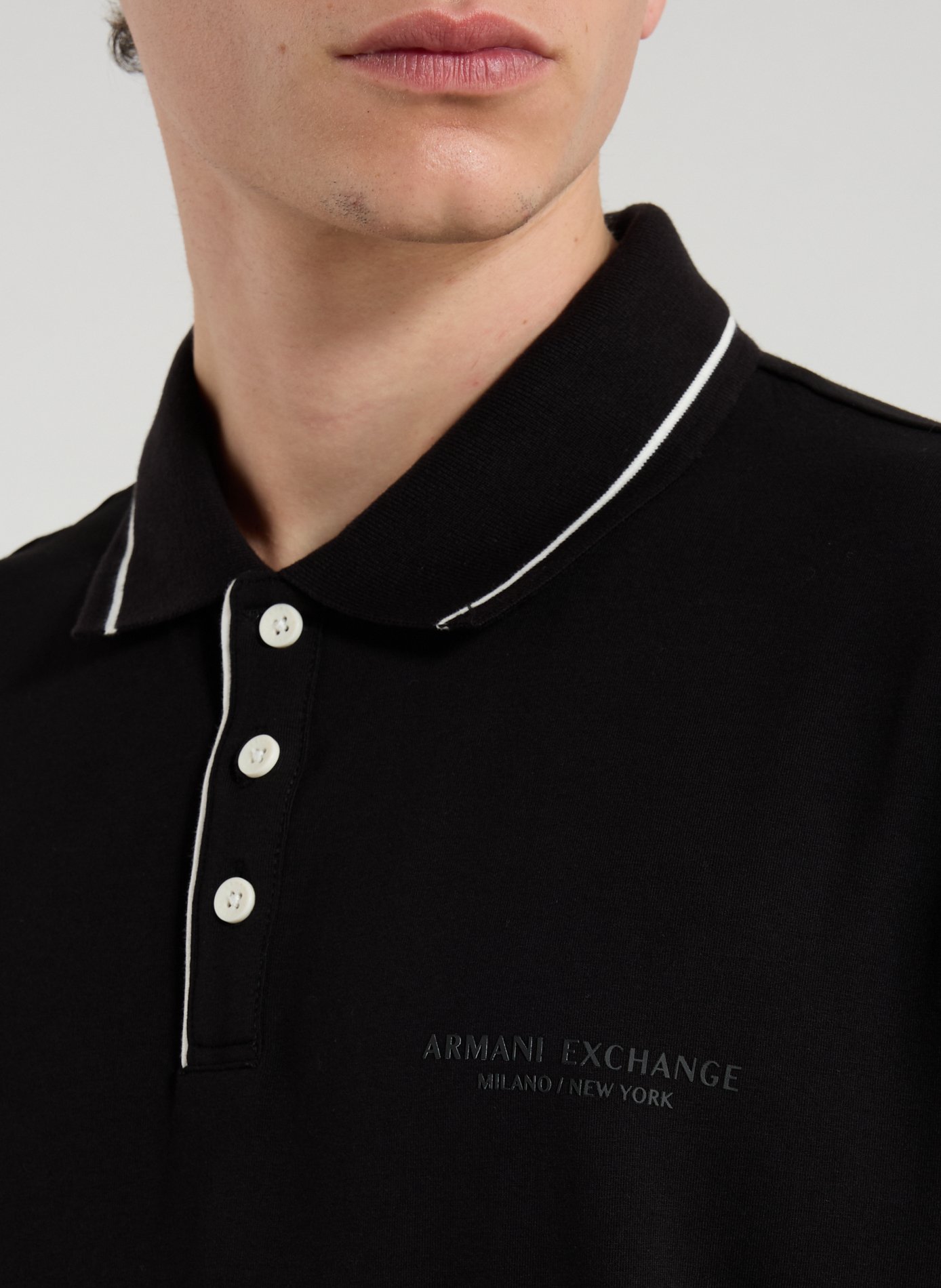 Polo uni en coton mélangé ARMANI EXCHANGE Noir