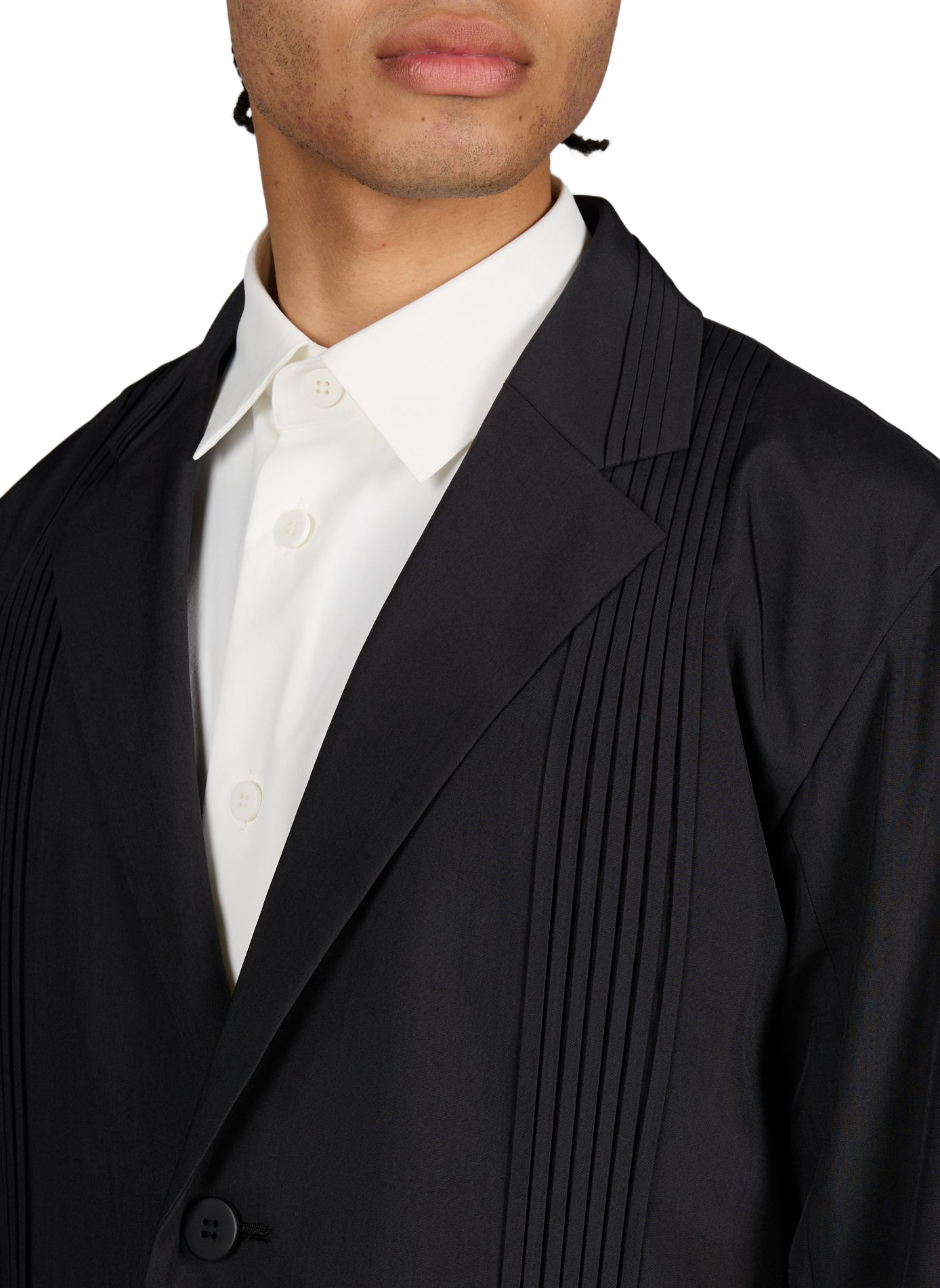 Straight blazer with a tailored collar. ISSEY MIYAKE Black