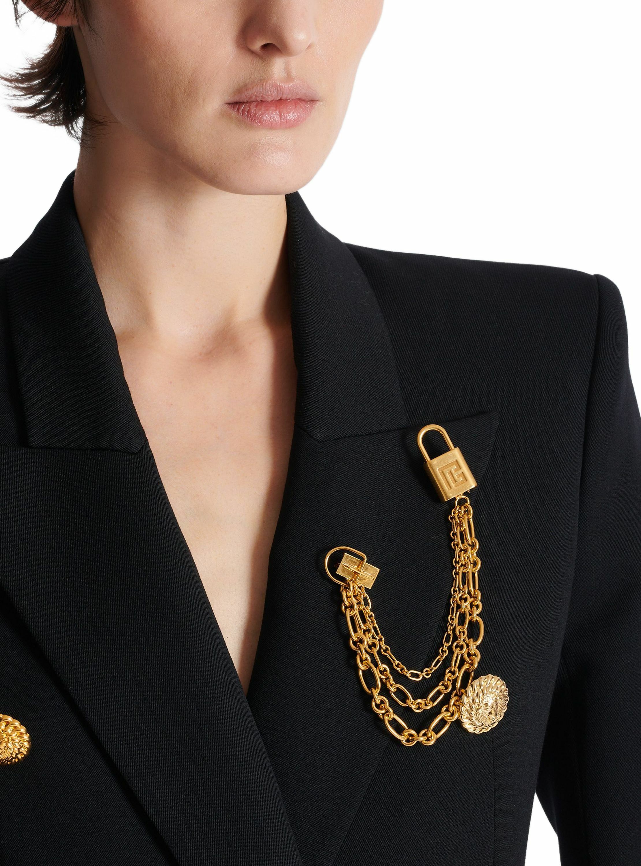 Broche sync en laiton avec chaînes BALMAIN Doré