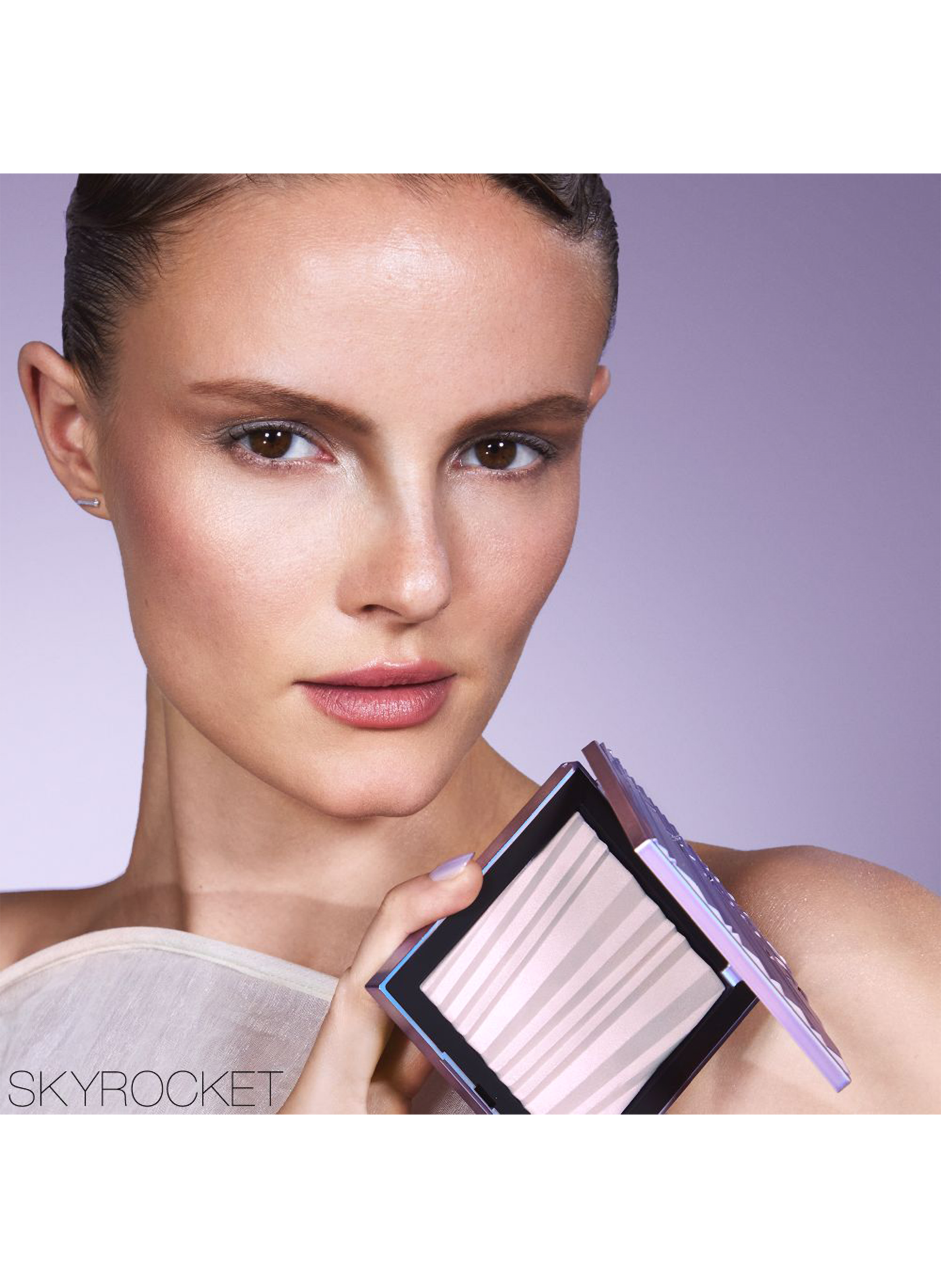 Aura Illuminating Powder - Poudre illuminatrice pour le visage et le corps NARS Skyrocket