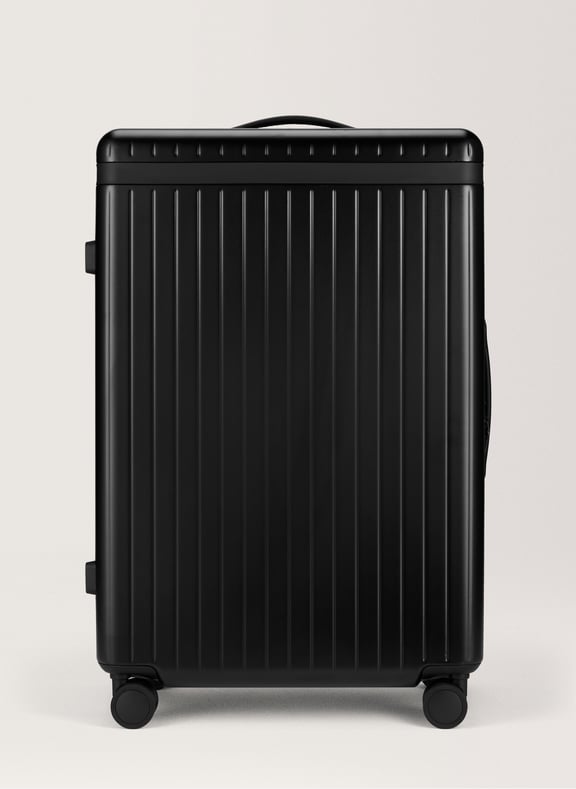 Valise 'the large check-in' en polycarbonate à fermeture zippée Noir by CARL FRIEDRIK CARL FRIEDRIK Valise 'the large check-in' en polycarbonate à fermeture zippée Noir