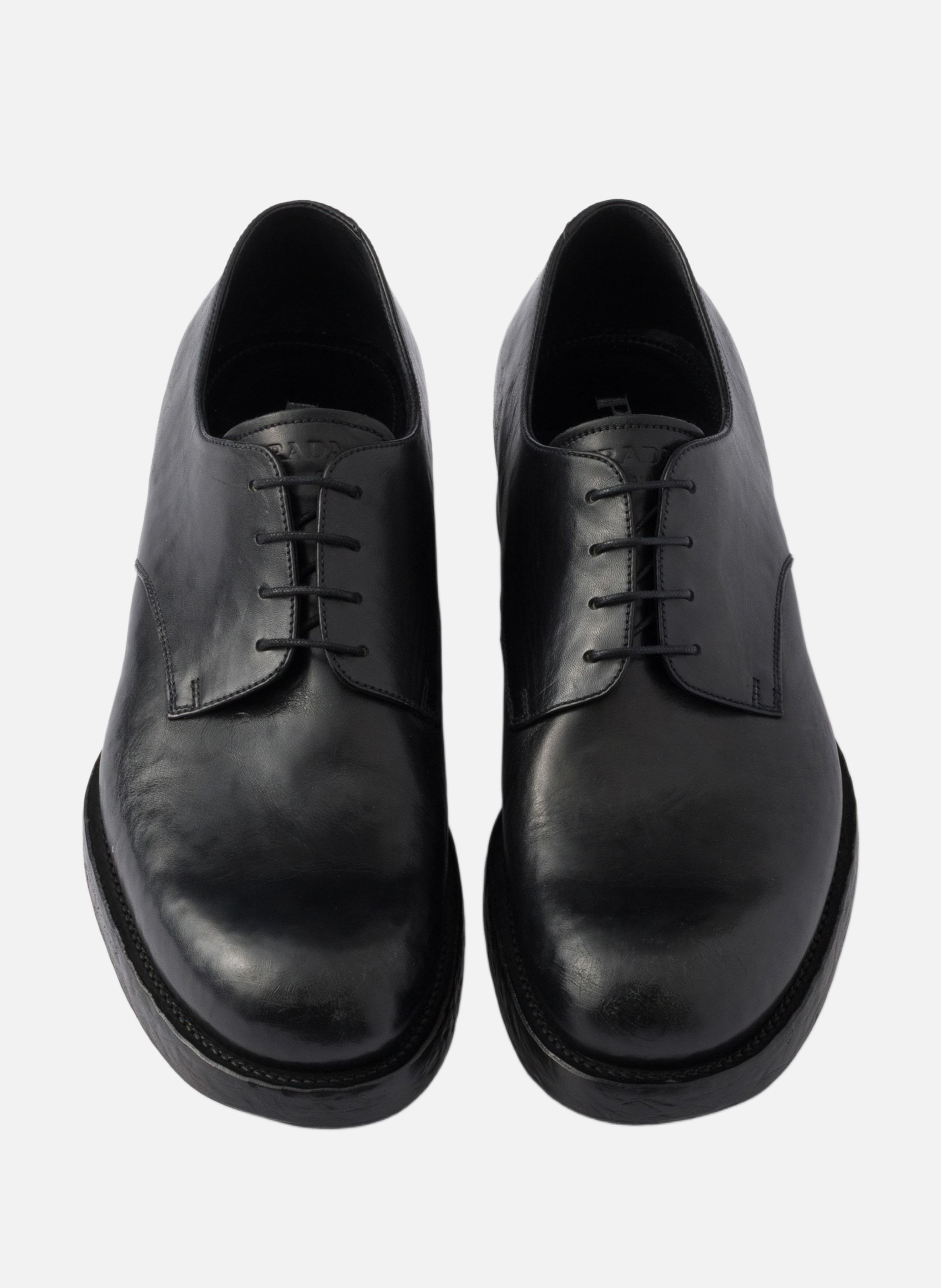 Chaussures à lacets en cuir vieilli PRADA Noir