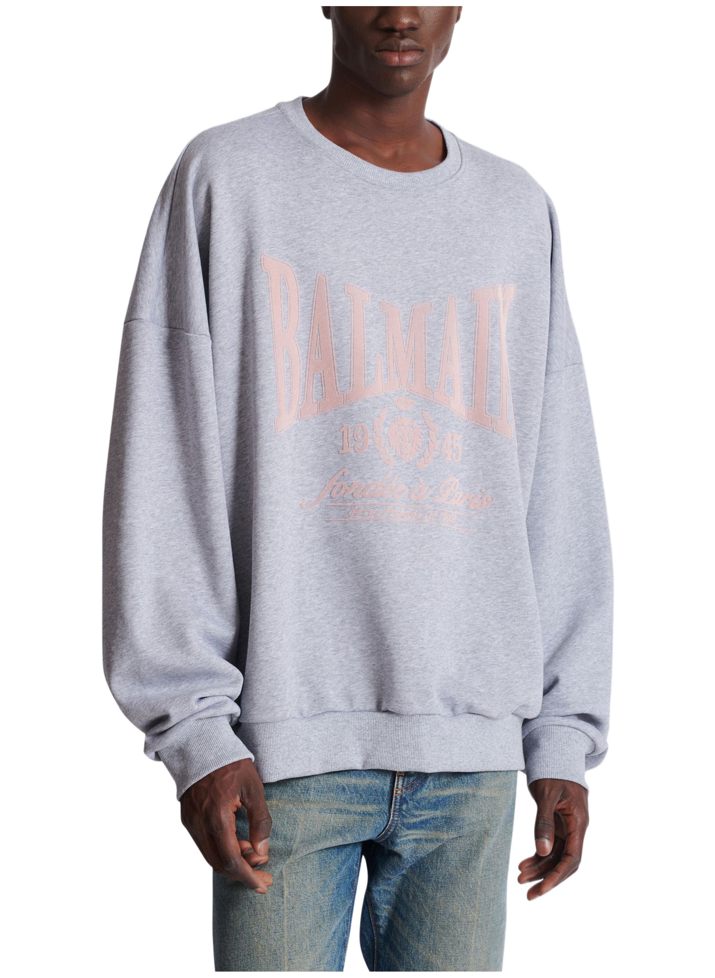 Sweatshirt en coton à imprimé BALMAIN Gris