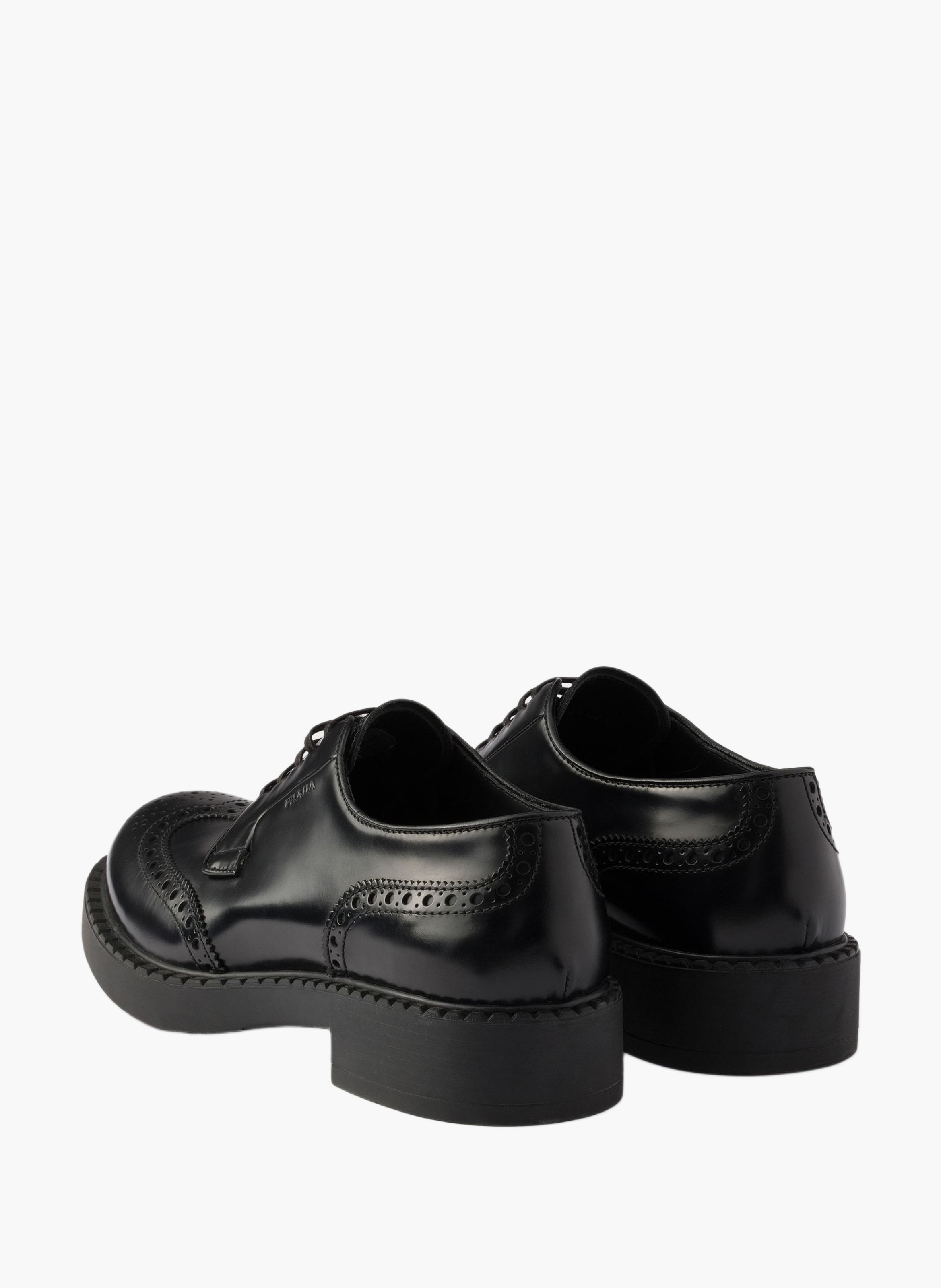 Derbies brogue en cuir brossé PRADA Noir