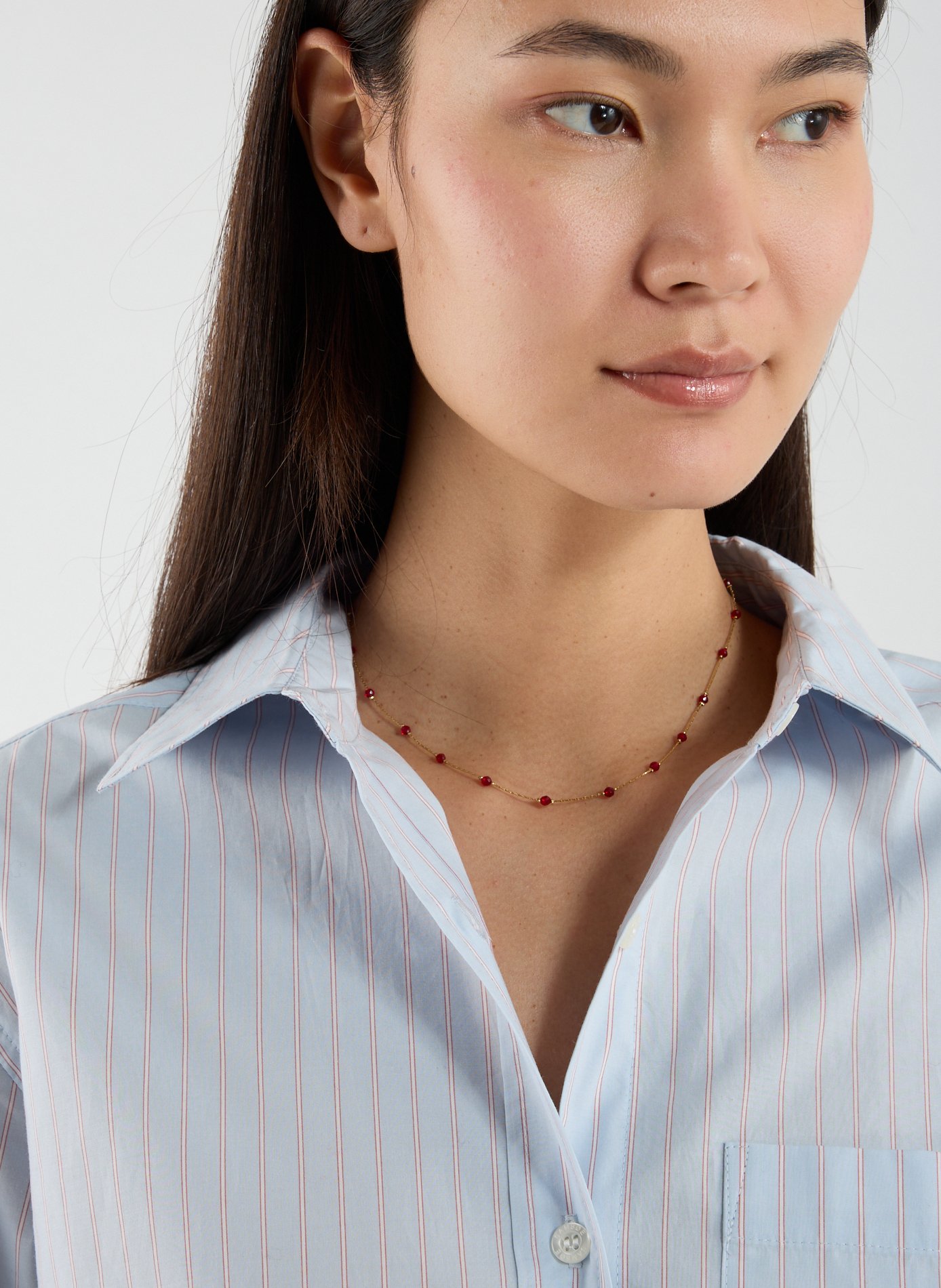 AU PRINTEMPS PARIS Collier avec perles en verre Rouge